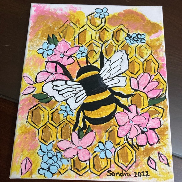 Bee on honeycomb - Picture 1 of 1